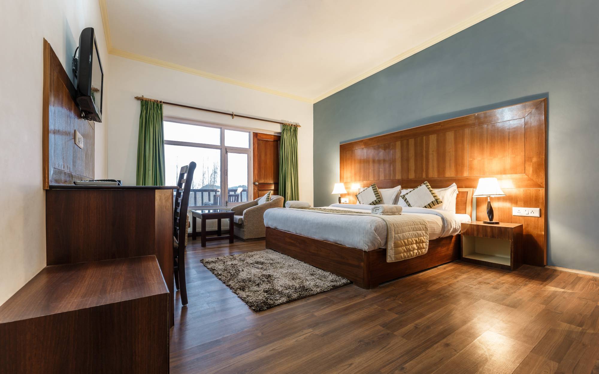 Deluxe room at Reenam Hotel
